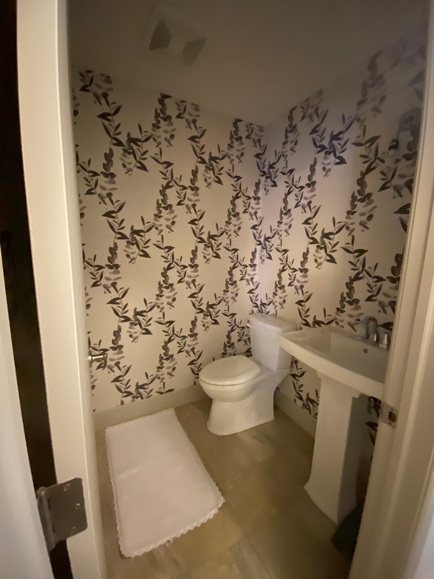 Muted green, grey, gray eucalyptus & olive foliage/leaves on cream background easy to install and remove peel and stick custom wallpaper available in different lengths/sizes locally created and printed in Canada. Removable, washable, durable, commercial grade, customizable and water proof.