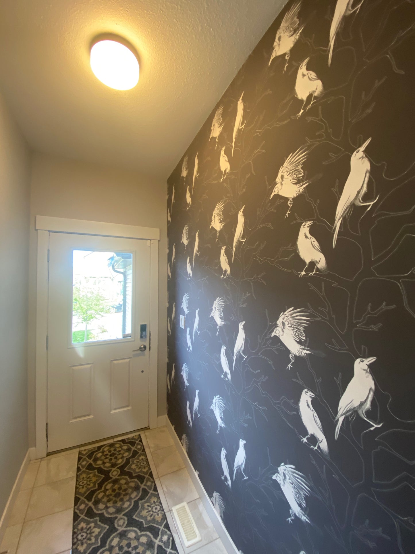 White crows and trees on black background easy to install and remove peel and stick custom wallpaper available in different lengths/sizes locally created and printed in Canada. Removable, washable, durable, commercial grade, customizable and water proof.